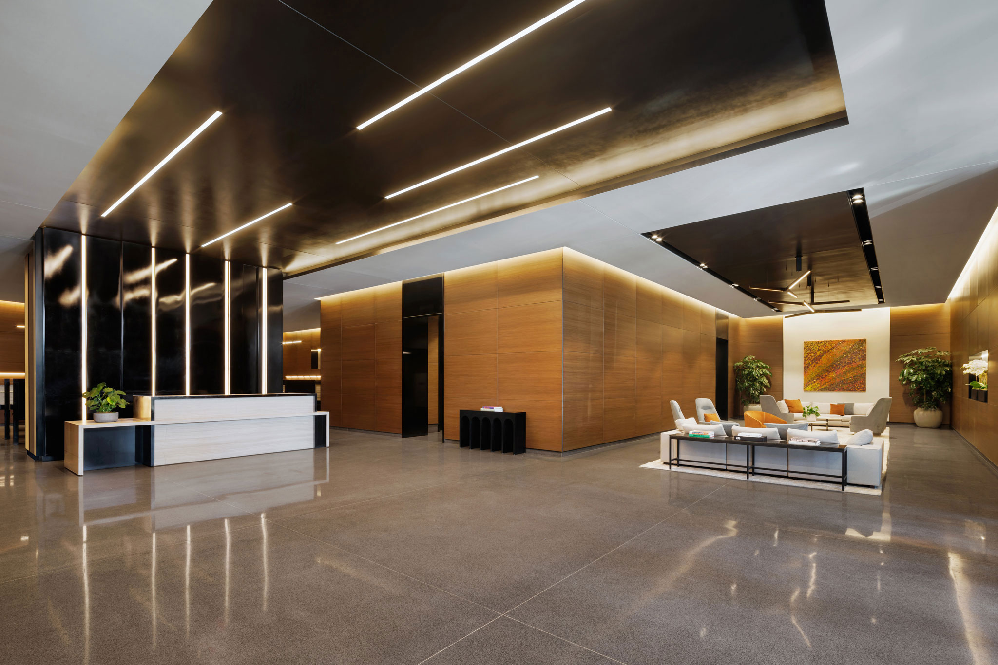 Brooklyn Crossing residential lobby with a concierge desk and bright seating area for guests